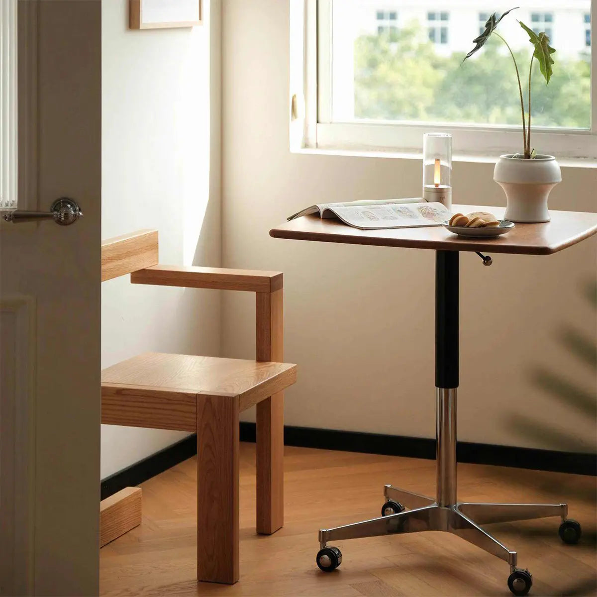 Elevora desk in Cherry finish by a window
