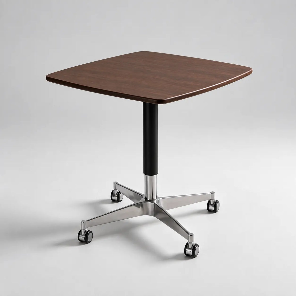 Elevora desk in Walnut finish with wheeled metal base