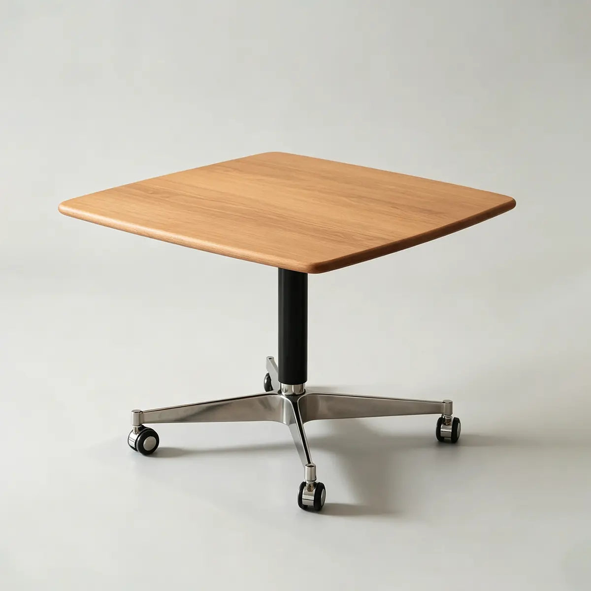 Elevora desk in Cherry finish on a wheeled base