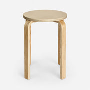 Wooden stool with a round seat on a white background