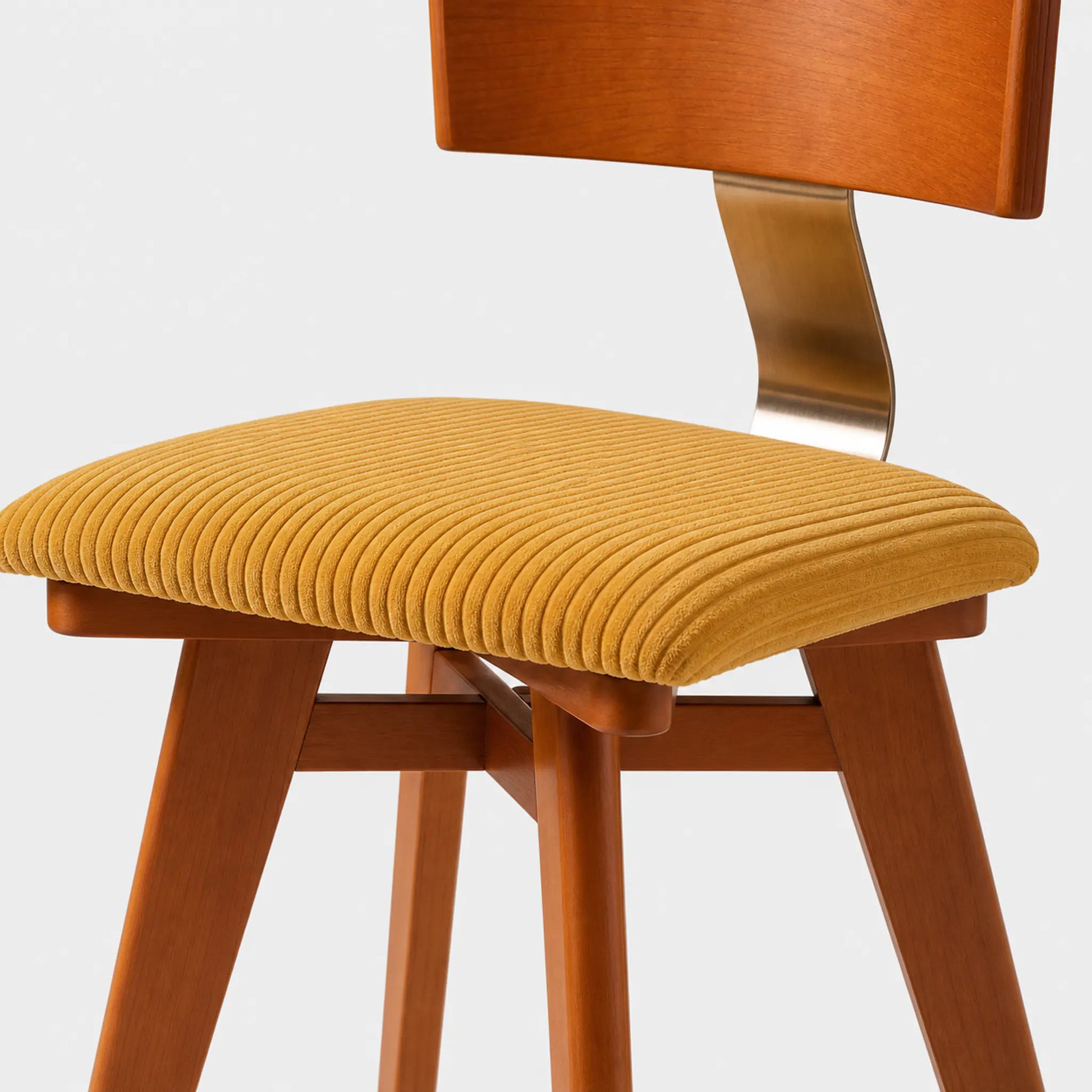 Galen yellow corduroy cushioned seat and curved birch back detail