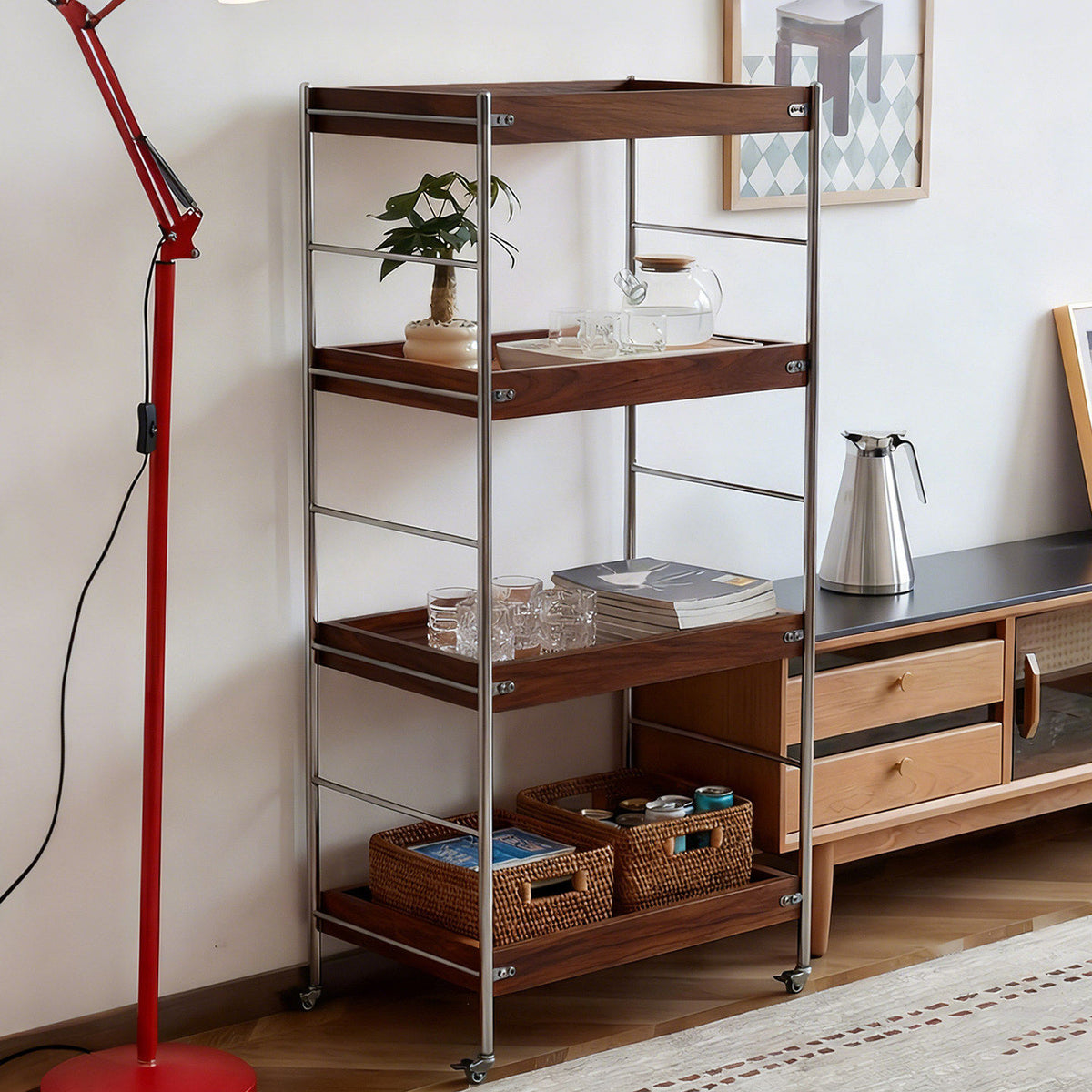 Dark wood Tove rolling cart used as open living room storage